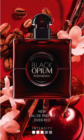 A bottle of YSL Black Opium Eau de Parfum with coffee beans, flowers, and a cherry in the background. Text reads 'New Eau de Parfum Over Red.'