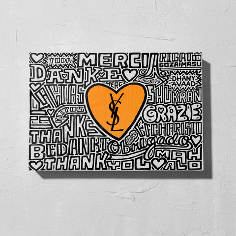 A canvas with various 'thank you' phrases in different languages and a large orange heart with the YSL logo in the center.