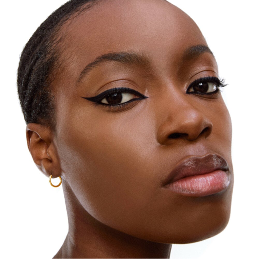 Close-up of a person wearing YSL makeup