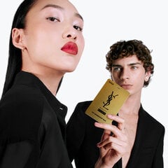 Two people in black outfits, one holding a gold YSL card.
