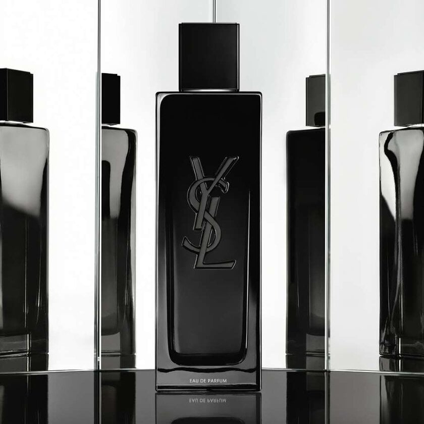 Black rectangular YSL perfume bottle with reflections.