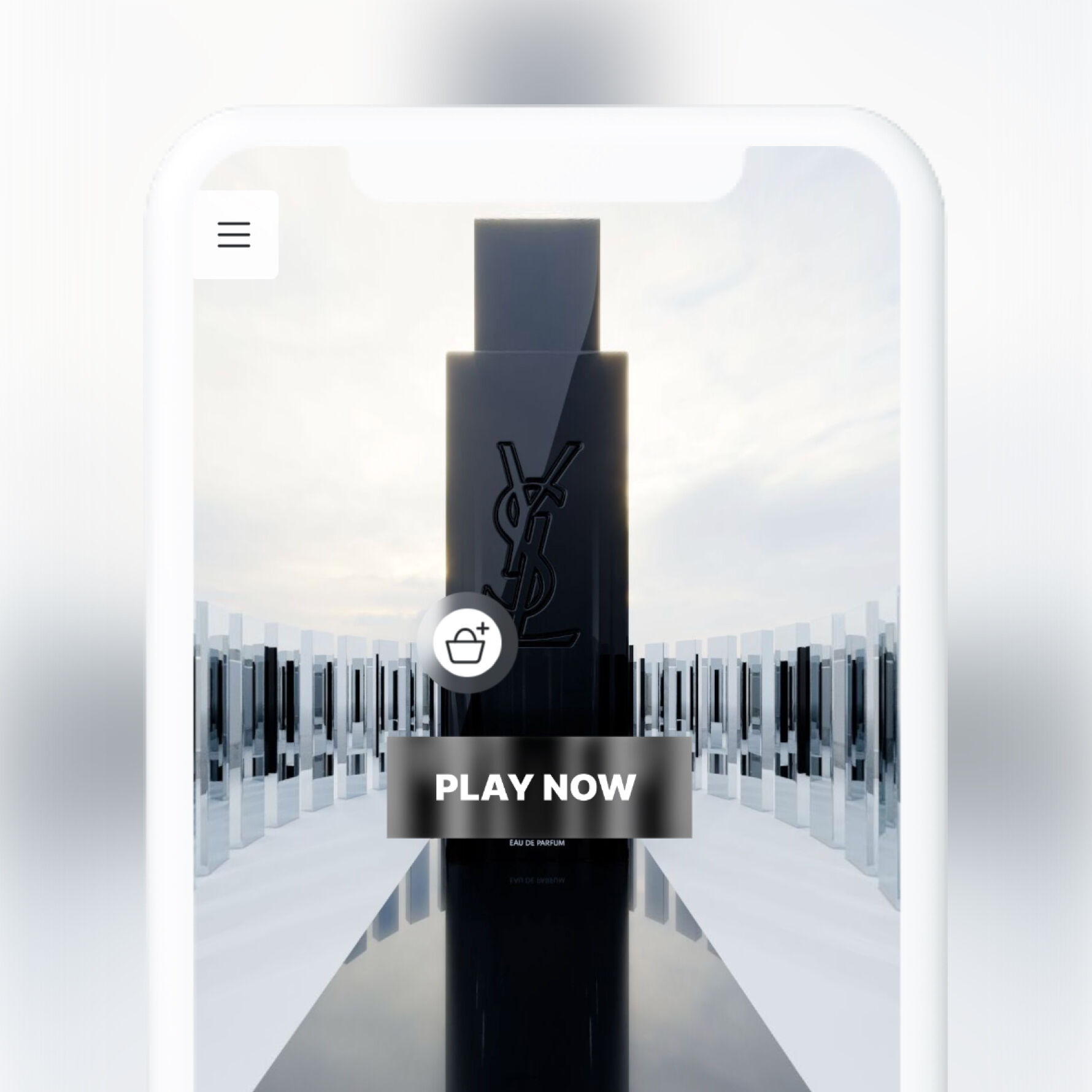 A mobile phone displaying a YSL product with the text 'Play Now.'