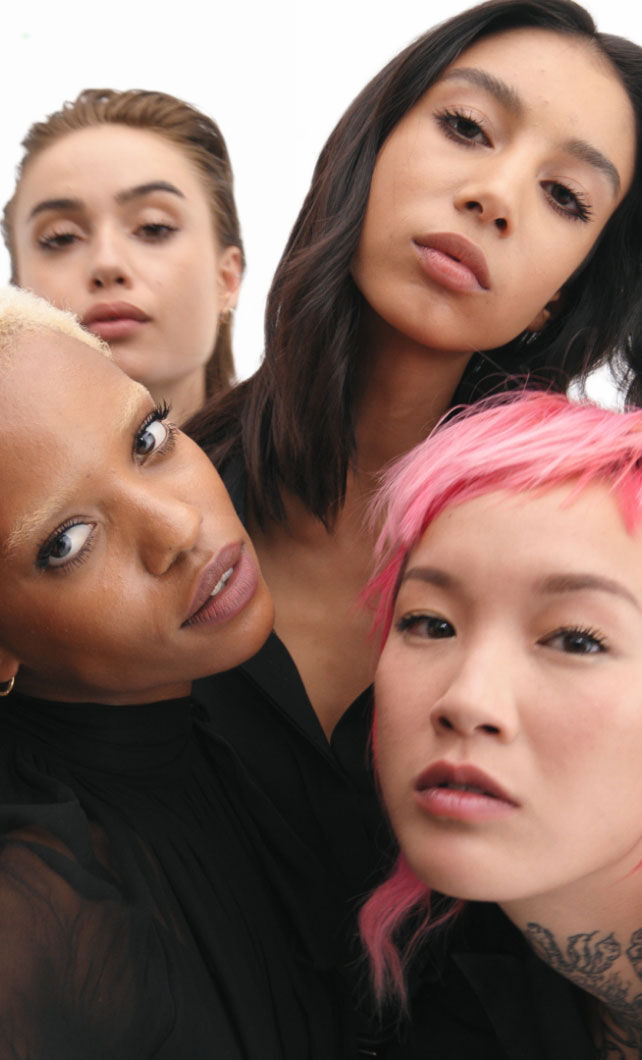 Group of people posing together.