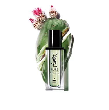 YSL Pure Shots serum bottle with a cactus in the background.