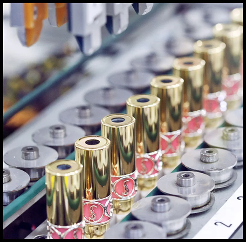 YSL lipsticks on a production line.