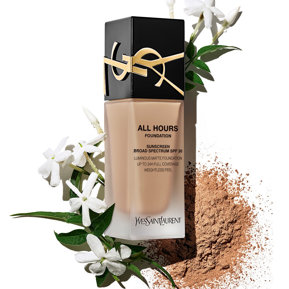 All hours foundation bottle surrounded by flowers and pigment