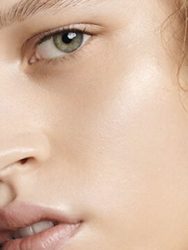 Close-up of a person's face with a natural makeup look.