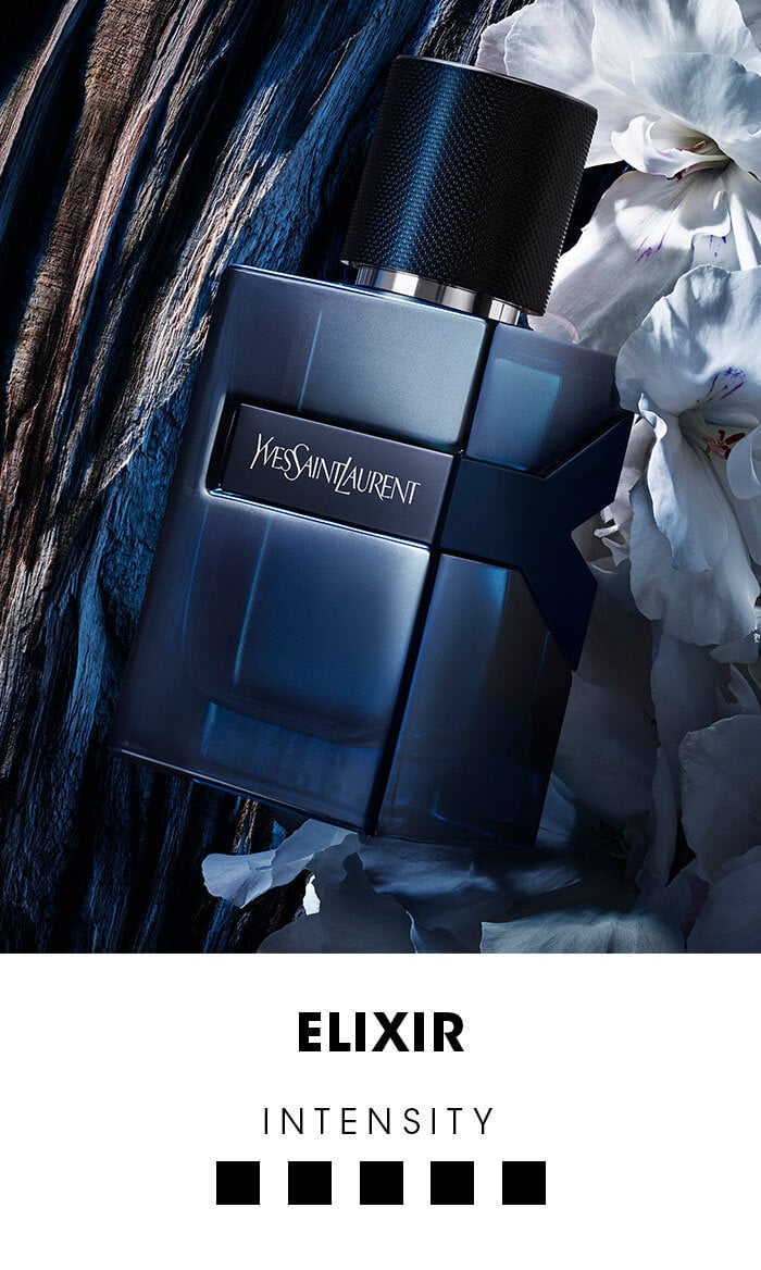 Yves Saint Laurent Y L'Elixir perfume bottle on a dark background.