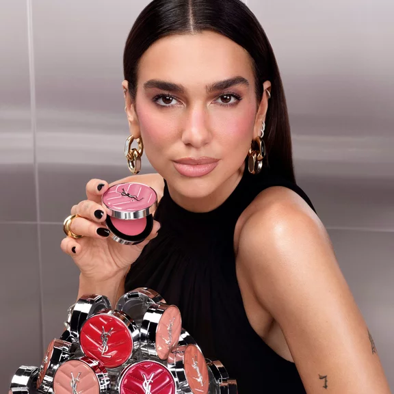 Dua Lipa holding Make Me Blush