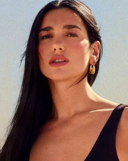 Dua Lipa posing in desert