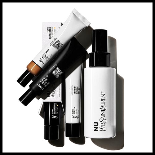 A collection of YSL Nu products including foundation, concealer, and tone corrector.