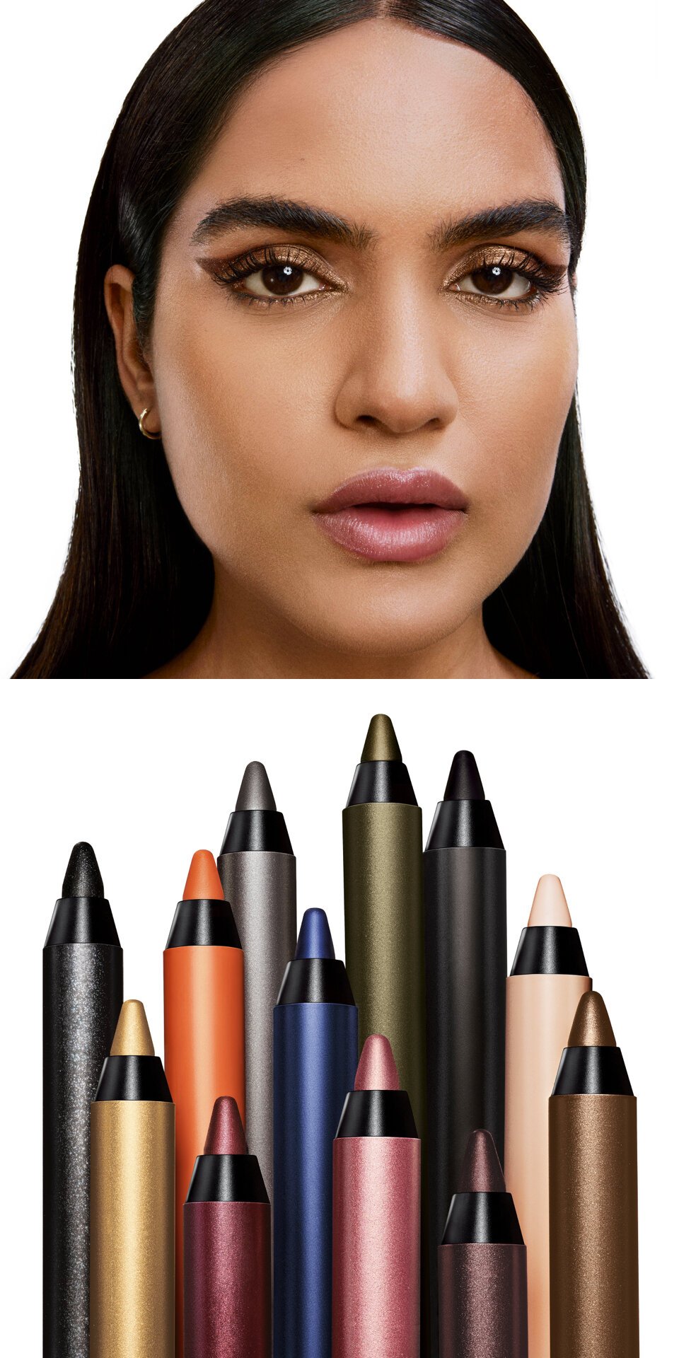 A person with various colored eyeliners.