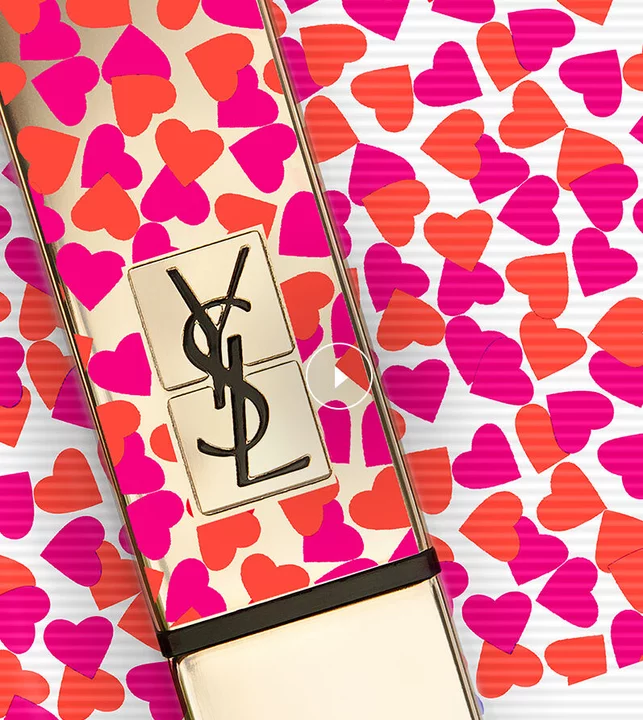A YSL lipstick with a pattern of pink and red hearts.
